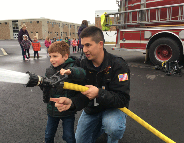 All the students had a chance to use the fire hose and spray away.